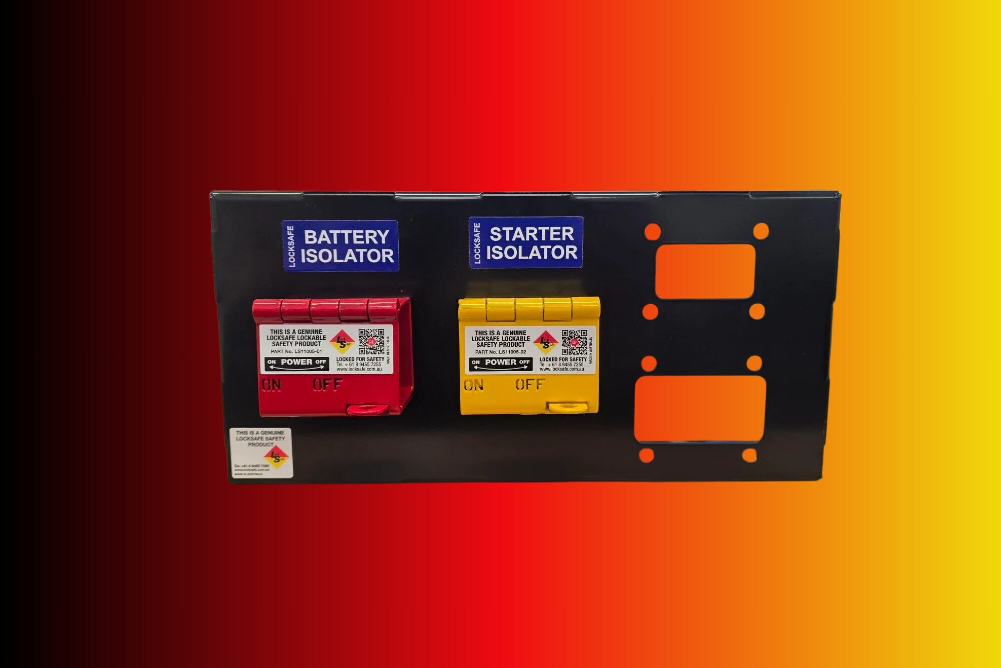 Mounting plate with red and yellow isolator switches fixed to black panel