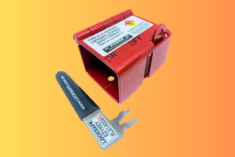 Red metal Locksafe electrical lockout bracket shown alongside a matching Ezykey tool against an orange gradient background.